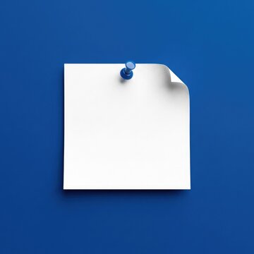 A single white square note paper pinned to a vibrant blue background with a curled top corner