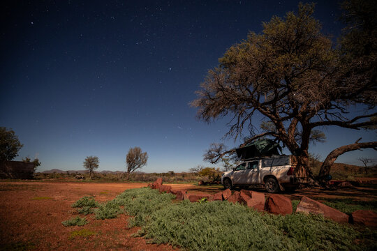 Camping under a starry desert night sky in Namibia