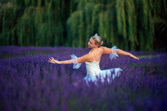 A ballet white dancer performs gracefully