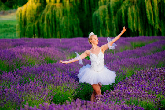 A ballerina dances gracefully in a lavender field in wa USA