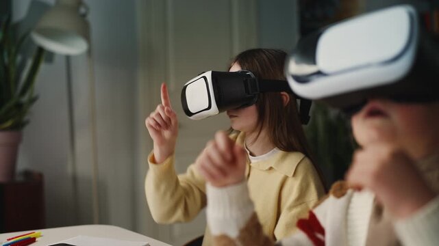 Two girls use VR headsets for home education, interactive digital learning