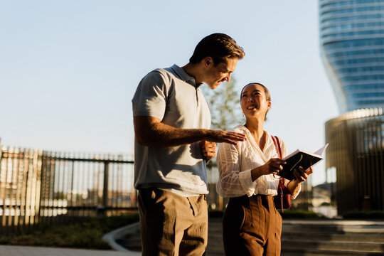 Exploring together in a vibrant urban landscape during golden hour