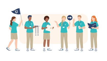 Obraz premium University campus tour guides stand in a row wearing matching teal polo shirts and holding directional signs and flags.