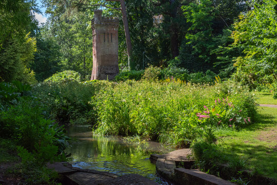 Upper Gardens, Bournemouth, UK - June 30th 2026: The Bourne Stream and the Water Tower, built between 1883 and 1903 in the grade II listed gardens.