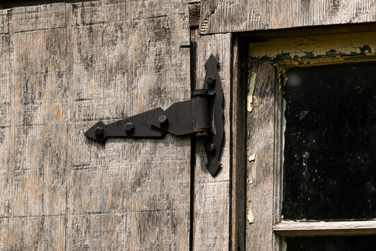 old wooden door hinge