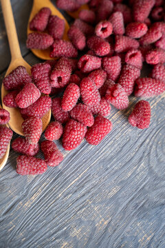 organic raspberries on wooden table background, food blogging, healthy eating concepts, and seasonal summer harvest themes. Small Farm food	