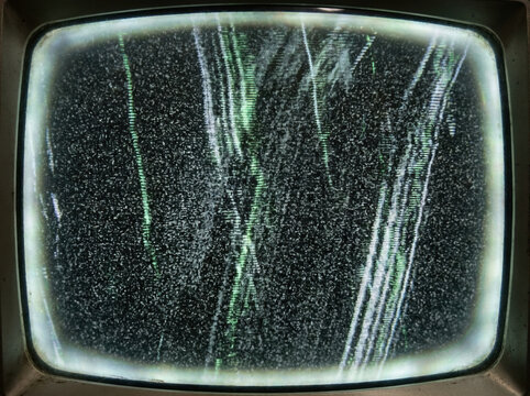 Vintage television screen with static noise and vertical signal interference lines