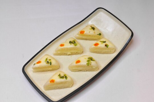 Malai sandwich or malai cham cham beautifully plated on white plate