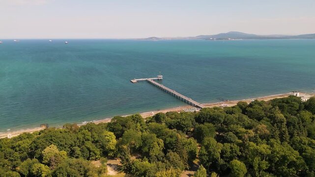 Aerial View of Burgas Sea Pier, Lush City Park, and Black Sea Coast, Bulgaria