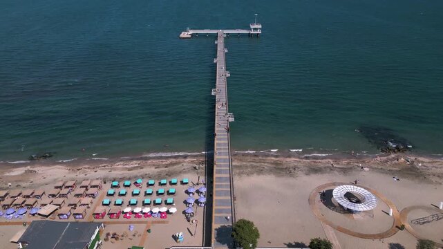 Aerial Top-Down View of Burgas Sea Pier, Sandy Beach, and Turquoise Water