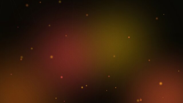 Warm bokeh light background with glowing orange and yellow particles.