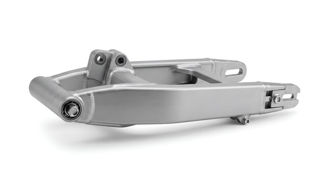 Motorcycle swingarm rear suspension part isolated on white background.
