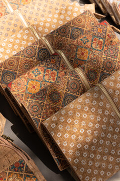 artisanal leather goods sold at an outdoor street market in europe