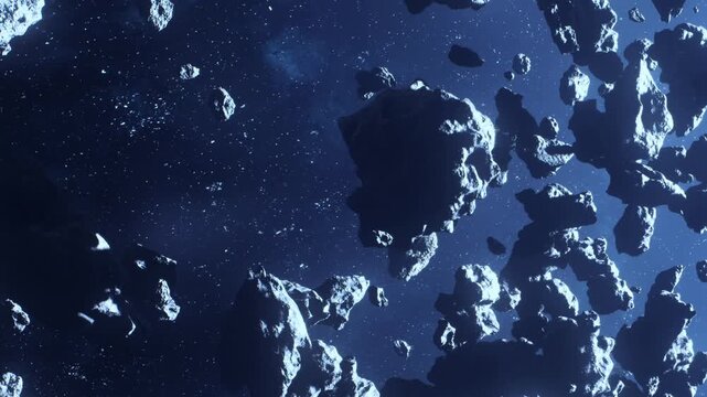 Rocks float in an asteroid field in outer space. Bright stars shine in the dark background. The scene shows a cluster of asteroids moving in different directions.