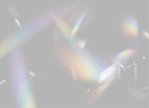 Iridescent light refractions scatter against a black background in an array of soft and sharp spectral shapes. The colors blend with hues of purple, orange, blue, and green in overlapping.