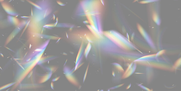 Prismatic light shards scatter across a black background with sharp, multicolored reflections. Radiant fragments display a spectrum of vivid hues in varied angular shapes and intensities.