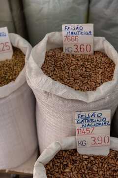 dried beans for sale in bulk at neighborhood grocery store in Lisbon, Portugal