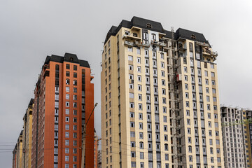 A view of new multi-story apartment complexes under construction in Bishkek, Kyrgyzstan. The image showcases the rapid urban development, real estate boom, and modernization of the city infrastructure © Dina Luk