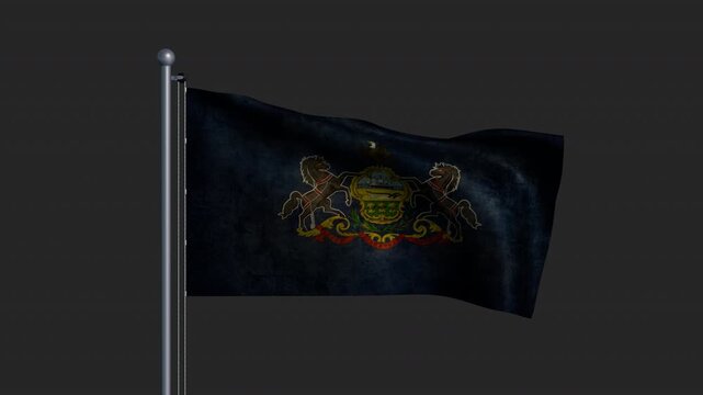 The flag of Pennsylvania on a pole with time-worn fabric fluttering in the wind