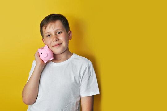 Boy with Piggy Bank