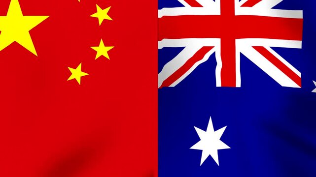 Waving flags of China and Australia side by side representing international diplomacy