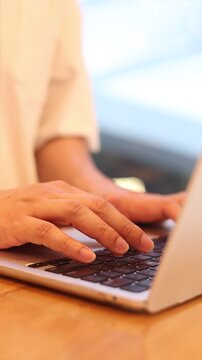 slow motion businessman hand type on laptop keyboard to search about information or data on internet or working and reply email to client for business and technology concept