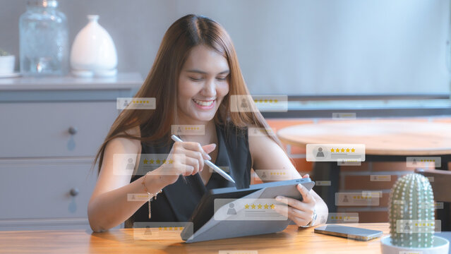 Smiling Businesswoman Reviewing Online Customer Ratings on Tablet