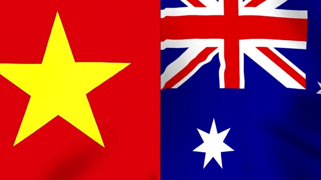 Waving flags of Vietnam and Australia placed side by side representing international diplomatic relations and partnership