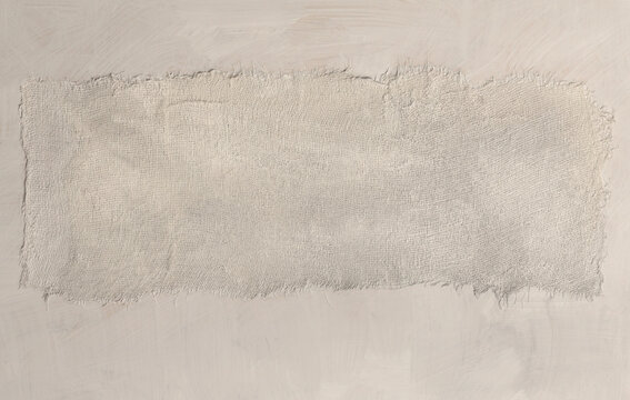 Torn, ripped blot crack crumble fabric, canvas pieces wall. Gray, beige white copy space grunge relief texture poster background.