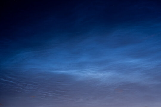 Silvery clouds against the sky