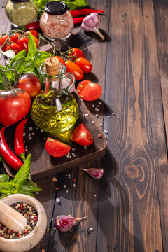 Fresh mediterranean cooking ingredients with olive oil and spices