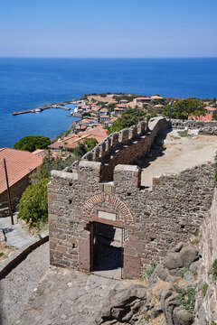 Stone gate and walls of the medieval fortress in Molyvos on the island of Lesbos