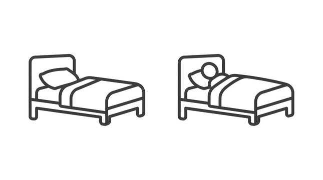Two simple beds with one person sleeping
