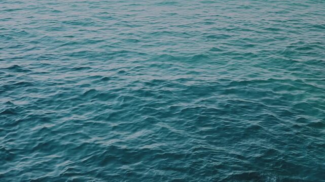 Blue sea water ripples, ocean waves texture