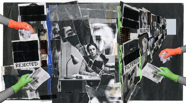 Office worker surrounded by photographs stamped rejected and filtered