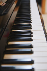 Fototapeta premium Closeup of piano keys and keyboard for music practice and piano class