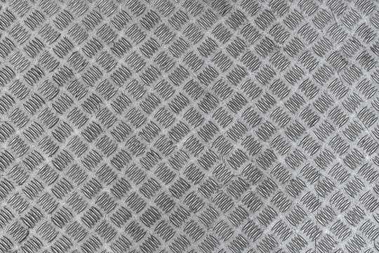 Industrial metallic diamond plate floor pattern