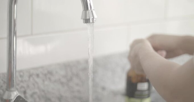 corona virus slow motion female hands washing soap and water covid