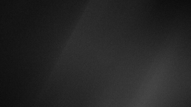 Dark, textured surface with soft gradient light. Muted tones suggest quiet, minimalist atmosphere. Ideal for design backgrounds or mood setting. Subtle contrast adds depth without distraction