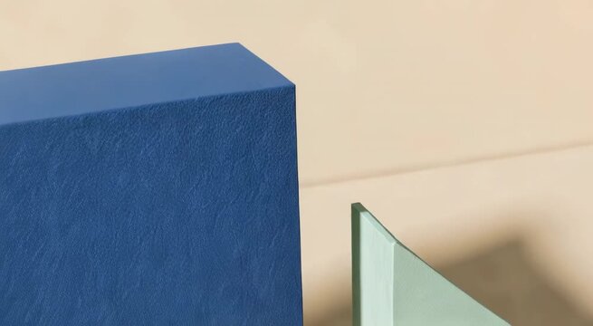 Minimal still life arrangement of pastel geometric shapes on a beige background, featuring stacked cubes, rectangles, semicircle, circle, triangle and stepped platform