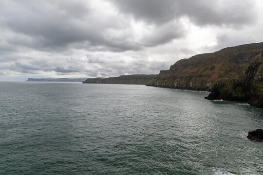 Scenic coastal landscape near Carrick-a-Rede Rope Bridge on the famous Causeway Coast Route in County Antrim, Northern Ireland