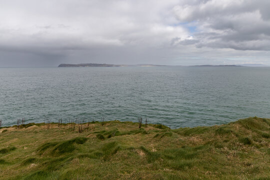 Stunning coastal cliffs and turquoise waters along the Northern Irish coast