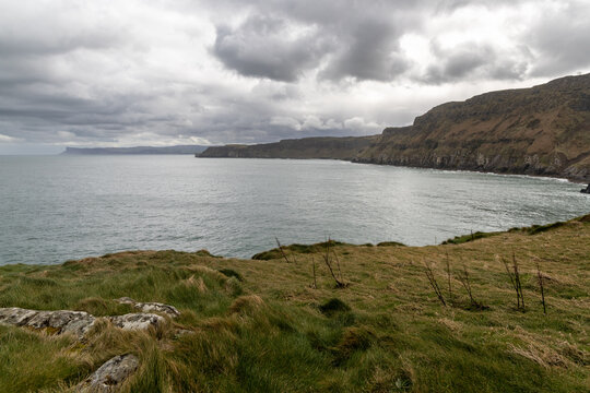 Stunning coastal cliffs and turquoise waters along the Northern Irish coast