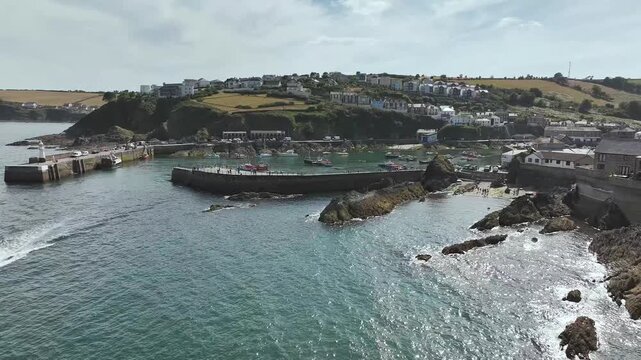Cliffs and a harbor over Port Village from a drone, Charlestown, St Austell, Cornwall, England