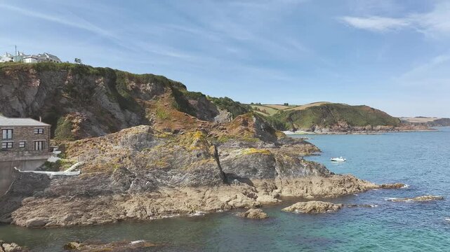 Cliffs and a harbor over Port Village from a drone, Charlestown, St Austell, Cornwall, England