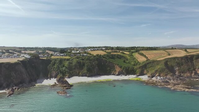 Cliffs and a harbor over Port Village from a drone, Charlestown, St Austell, Cornwall, England