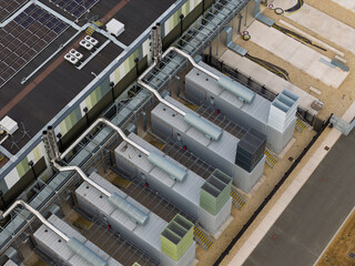 Aerial View of Industrial Backup Generators at a Modern Data Center Facility During the Daytime © Tom