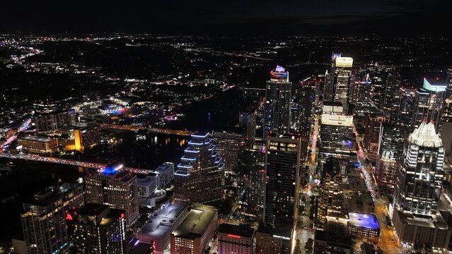 Aerial view of downtown city lights of while the sun is setting