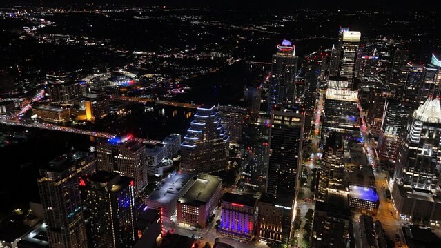 Aerial view of downtown city lights of while the sun is setting