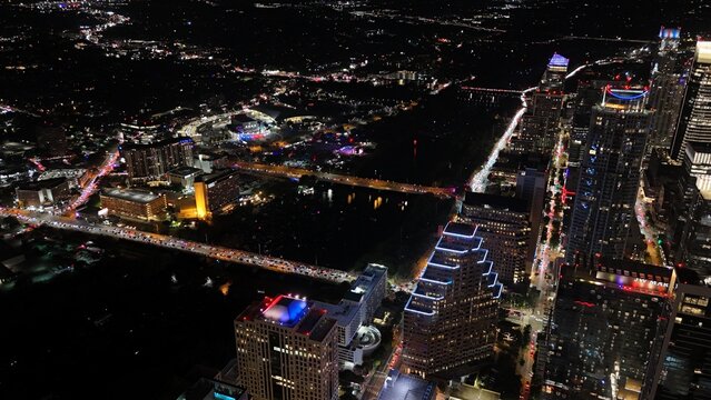 Aerial view of downtown city lights of while the sun is setting